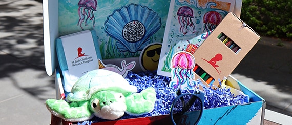 couple walks down a red carpet to the spring formal