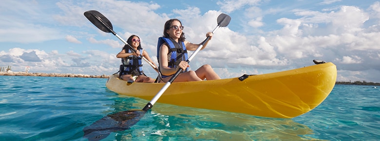 group of guests prepping to go kayaking
