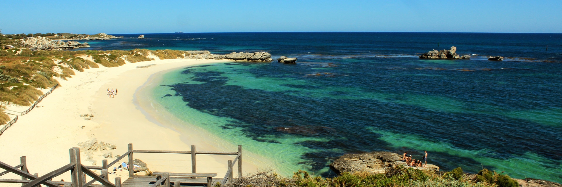 the ocean brushes up on a beach in fremantle