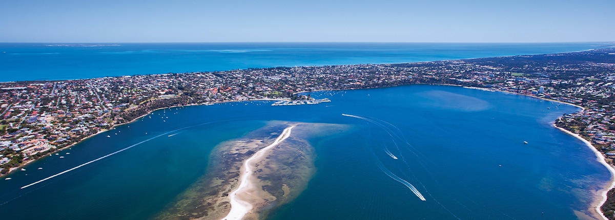 the ocean brushes up on a coast in fremantle