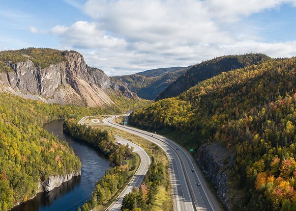  view of a scenic road during a vibrant sunny day near corner brook, newfoundland