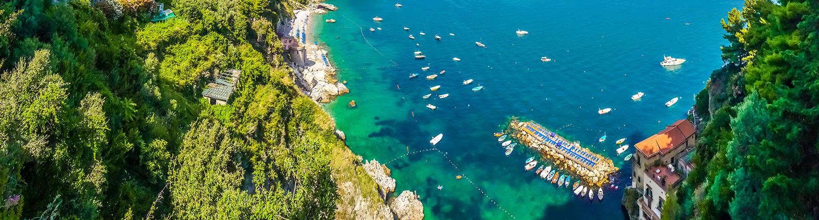 Looking down at the blue waters from the mountaintop in Capri, Italy