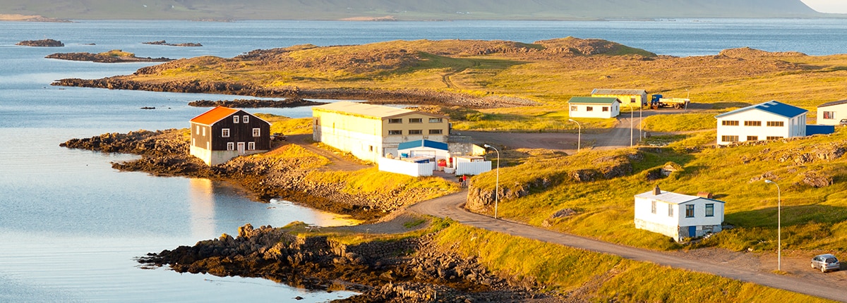 view of small village and fishery in djupivogur, iceland
