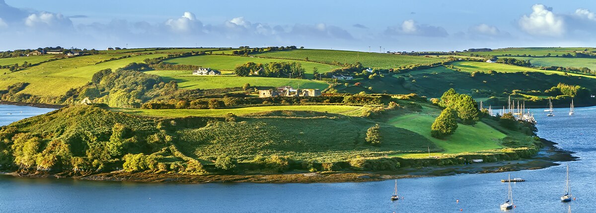 view of green hill with water from Charles Fort, Ireland