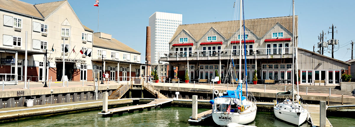 boats docked in a galveston harbor