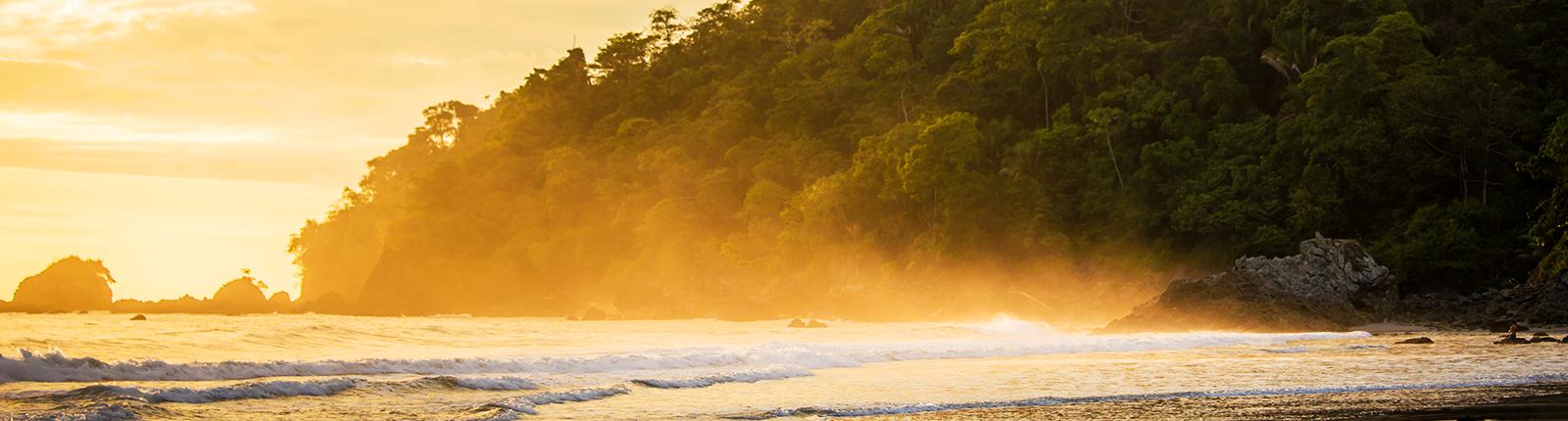 Ocean mist cascading over a beautiful coast in Puntarenas, Costa Rica