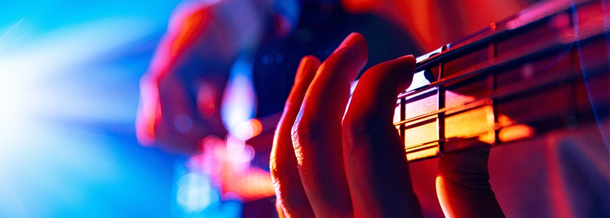 a person plays a guitar