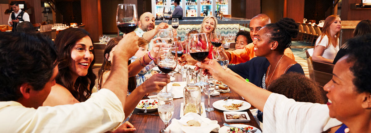 Families enjoying dinner at the dining room.