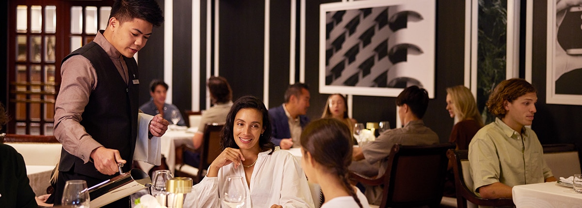 a couple dines at lukes bar and grill