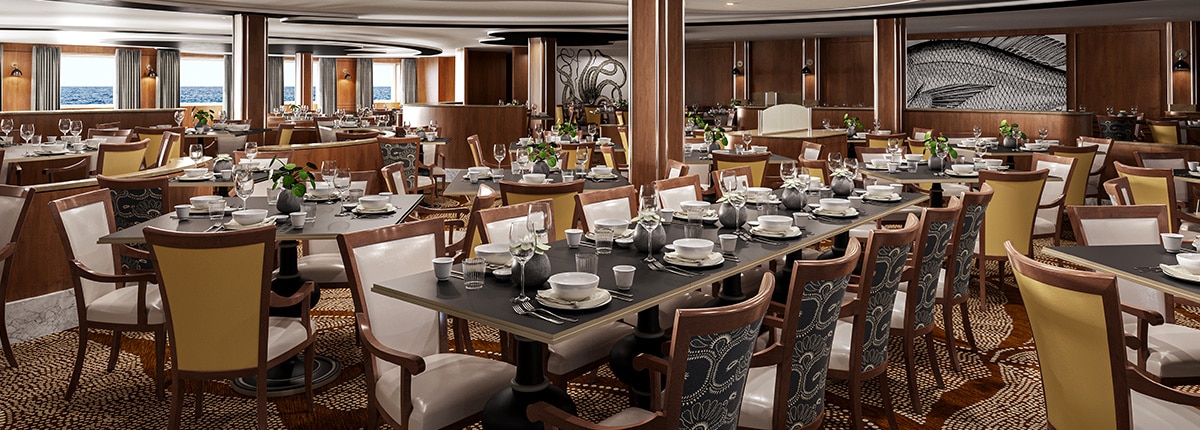 view of the dining tables and chairs in the waterfront restaurant