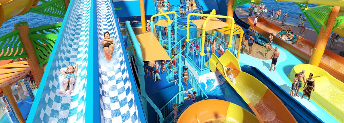 two guest race down a blue and white waterslide onboard carnival festivale