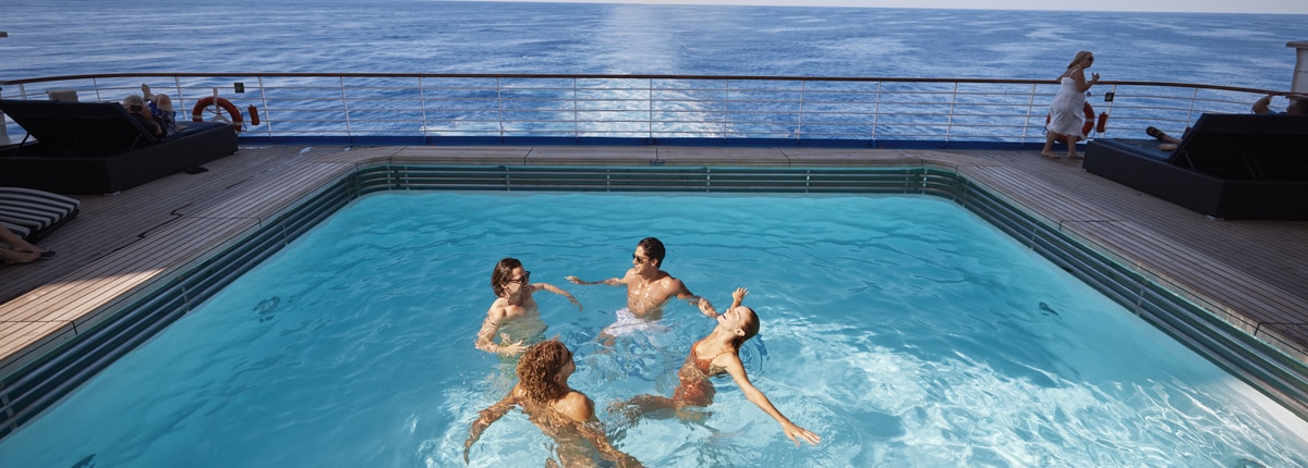 guests spends time inside of a pool