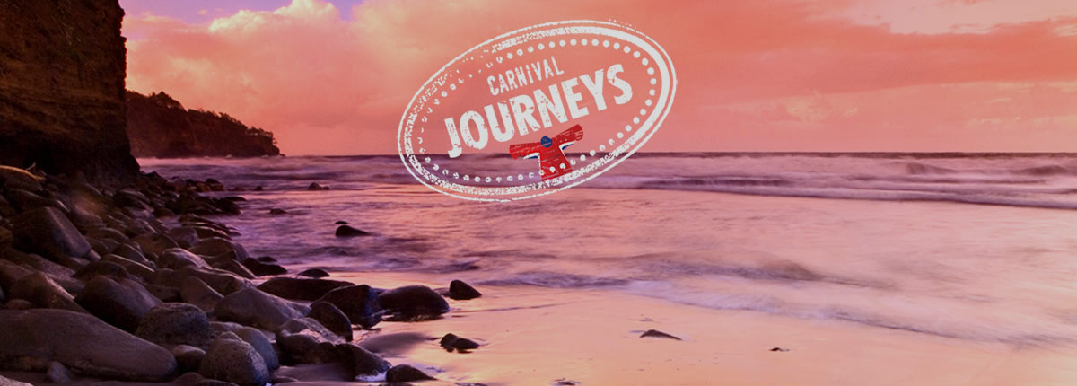 view of beautiful beach destination with carnival journeys logo