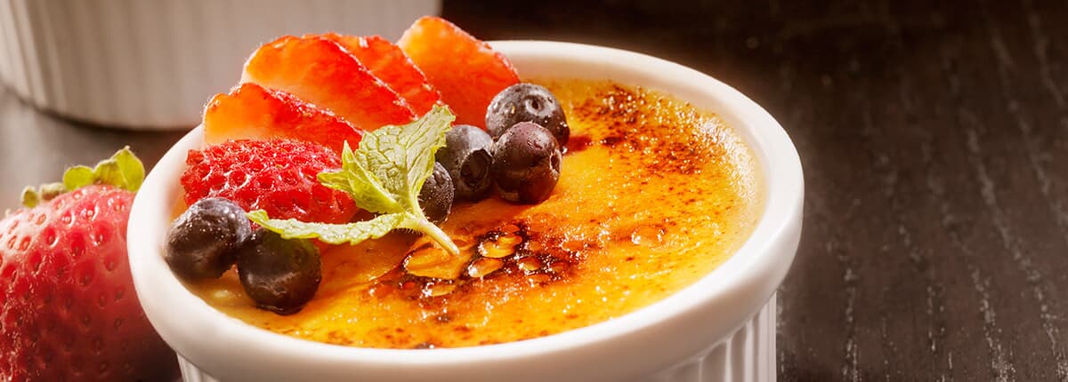 Creme Brulee with a fruit garnish