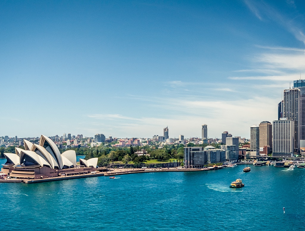 view of the sydney skyline on a bright, sunny day