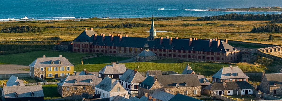 view of a town near the ocean in sydney, nova scotia