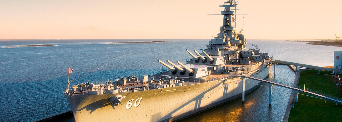 USS Alabama vessel during sunset in Mobile