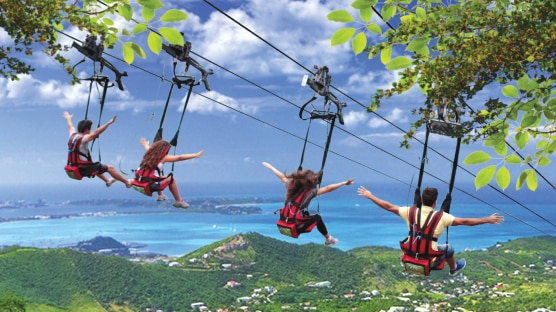 view of the guests participating in the flying dutchman zipline ride in st maarten